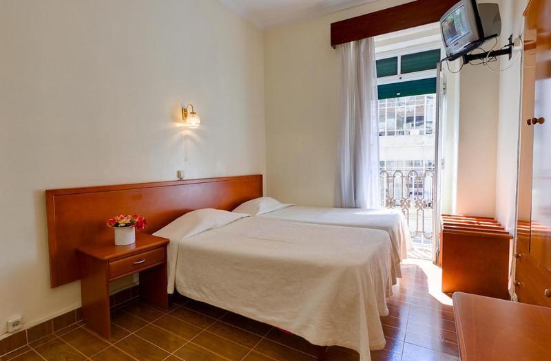 Hotel Modelo Lissabon Zimmer foto